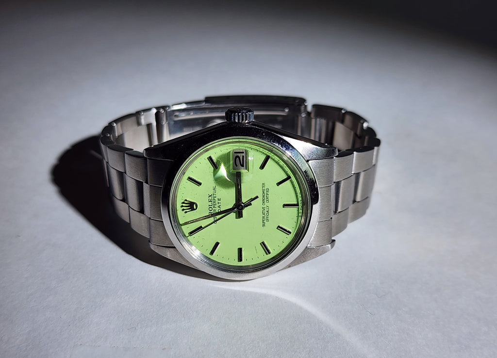 Custom Vintage Rolex Date with original Lime Green dial and an original stainless steel band.